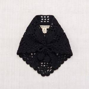 misha and puff black crochet scarf with pom poms
